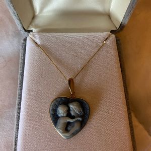 Gold Necklace with baby and mom never worn